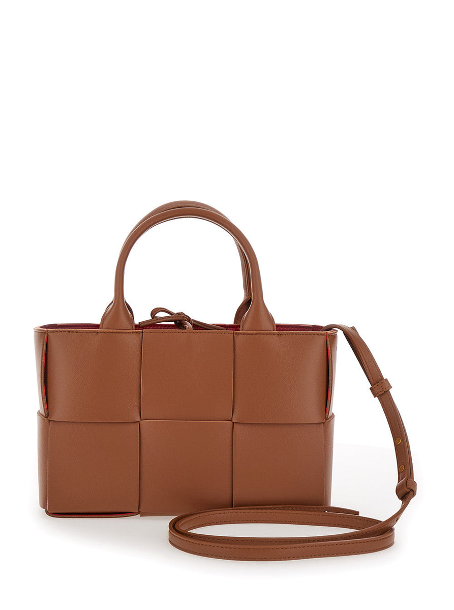 Close-up of Bottega Veneta shoulder bags hardware and fine stitching