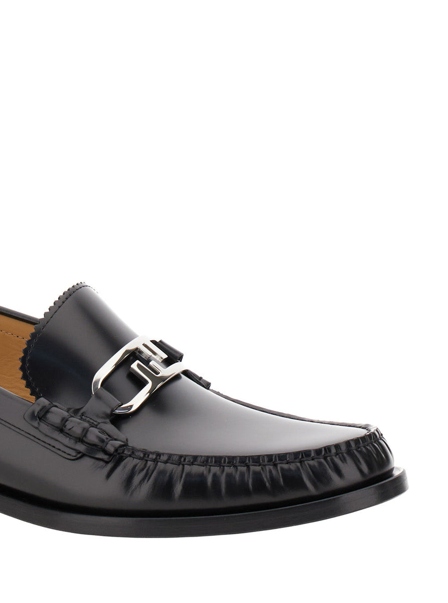 Close-up of Fendi slides hardware and fine stitching