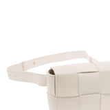 Close-up of Bottega Veneta backpacks hardware and fine stitching