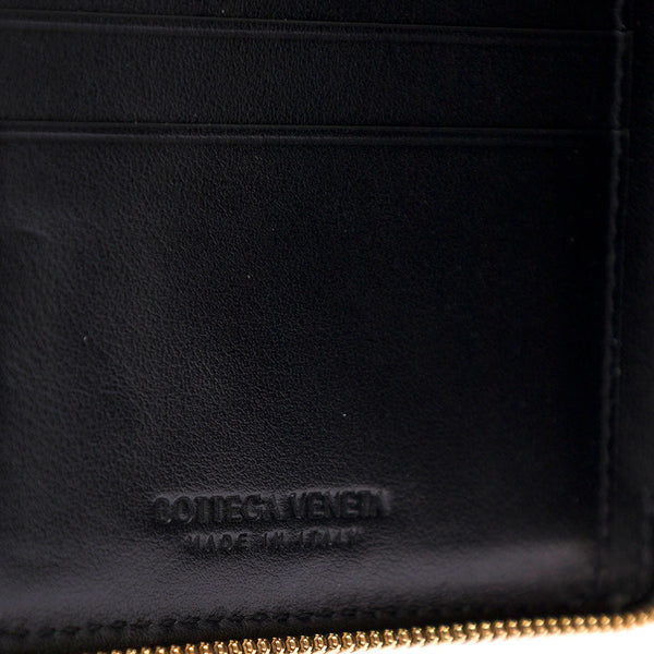 Close-up of Bottega Veneta jackets hardware and fine stitching