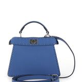 Close-up of Fendi shoulder bags hardware and fine stitching