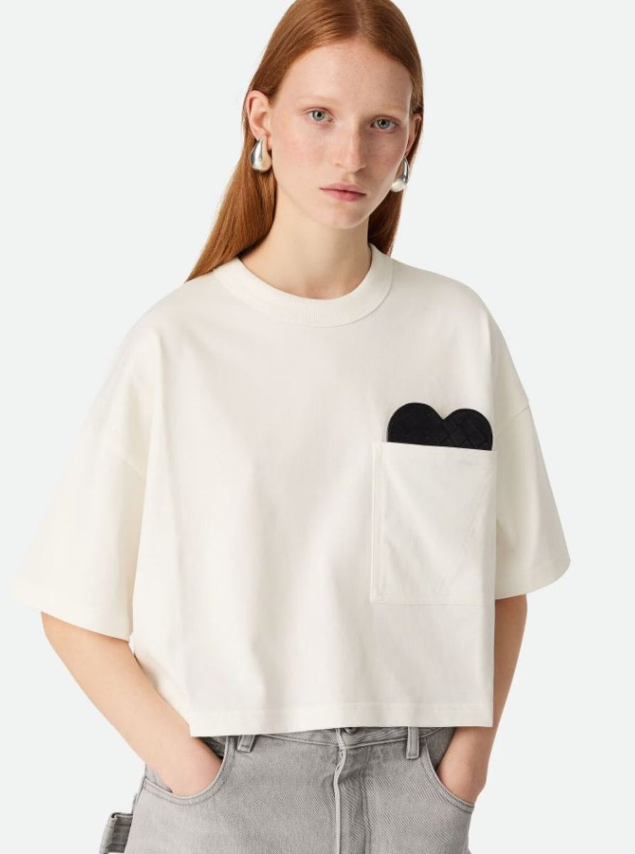 Close-up of Bottega Veneta tee shirts hardware and fine stitching