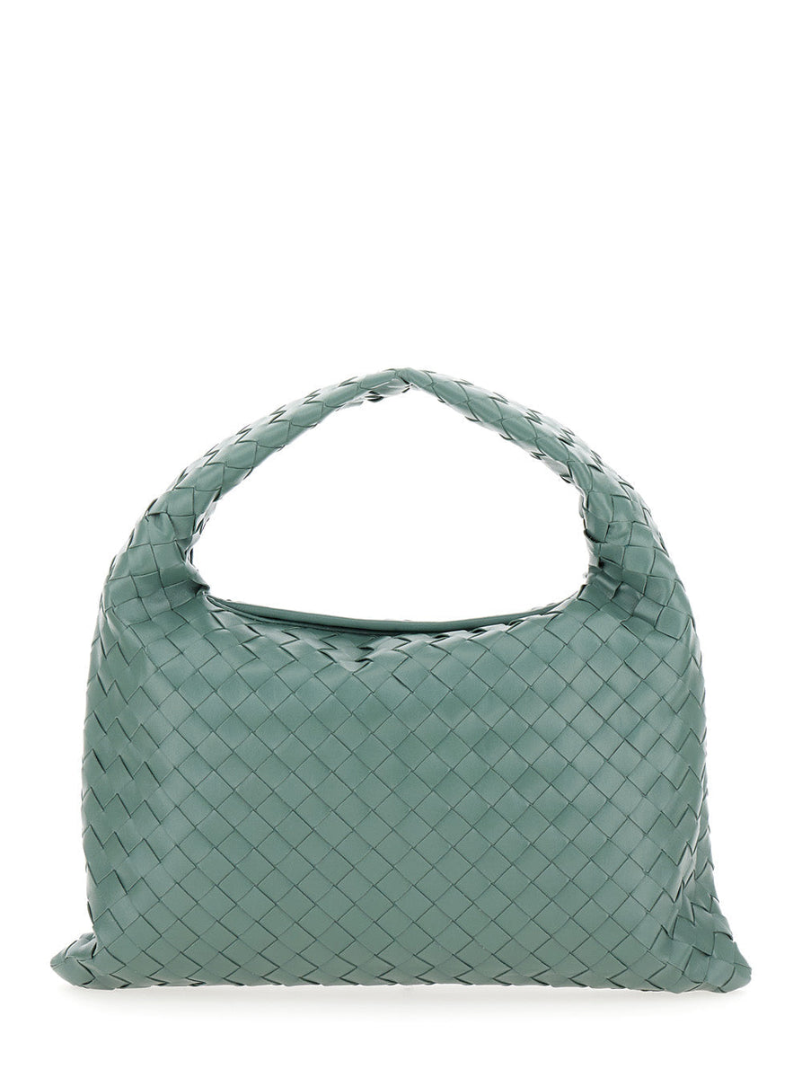 Close-up of Bottega Veneta shoulder bags hardware and fine stitching