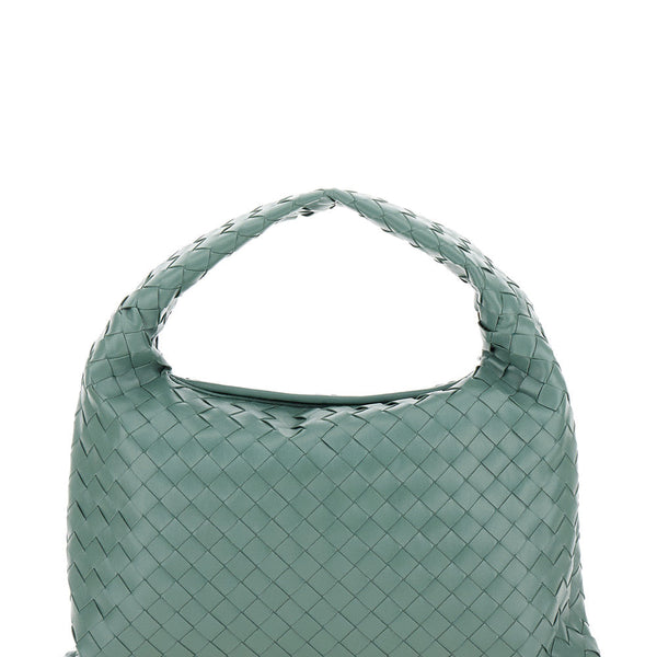 Close-up of Bottega Veneta shoulder bags hardware and fine stitching