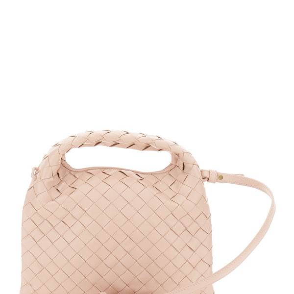 Close-up of Bottega Veneta cross body bags hardware and fine stitching