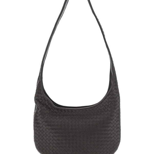 Close-up of Bottega Veneta cross body bags hardware and fine stitching
