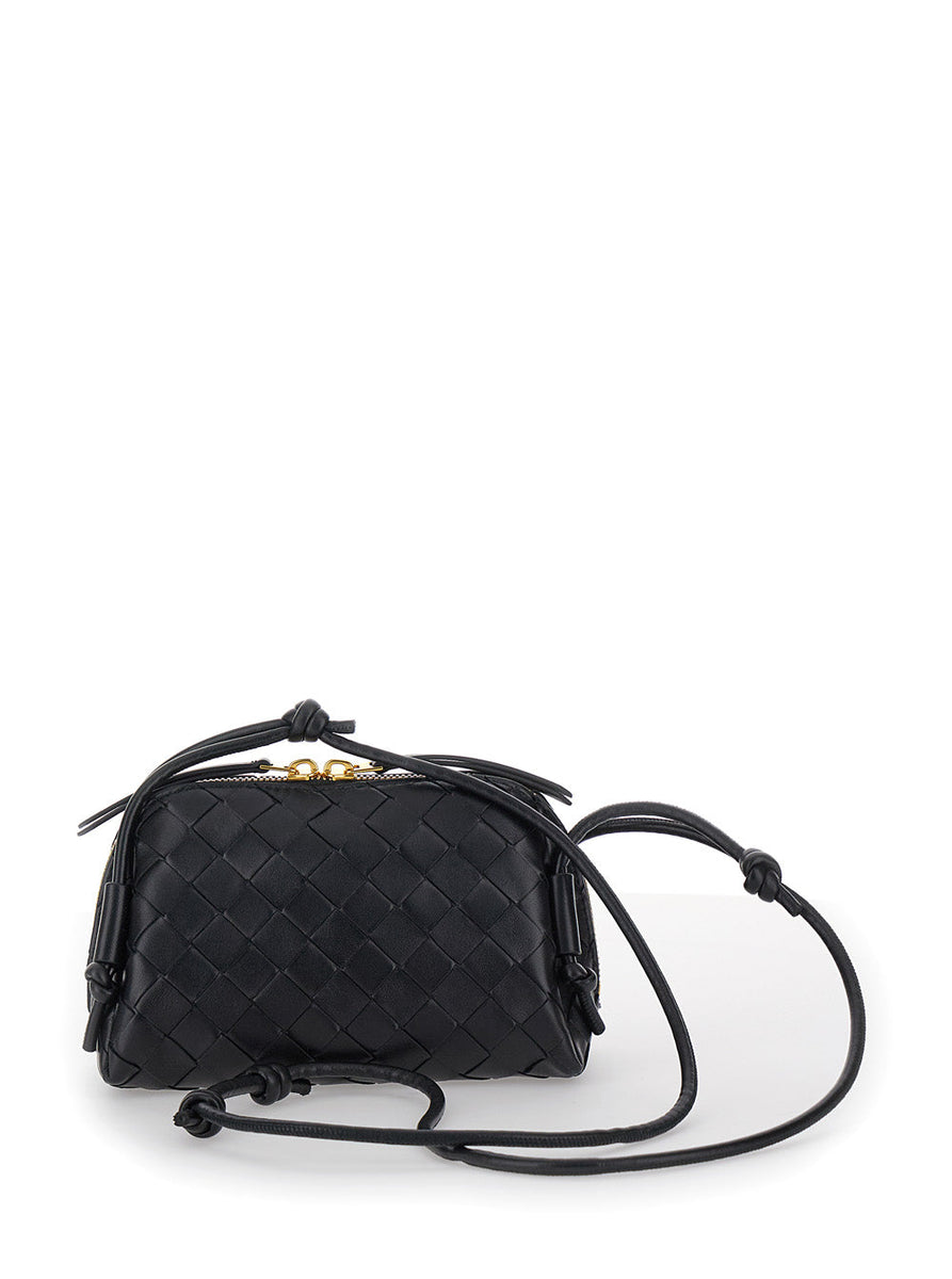 Close-up of Bottega Veneta cross body bags hardware and fine stitching