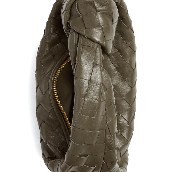 Close-up of Bottega Veneta shoulder bags hardware and fine stitching