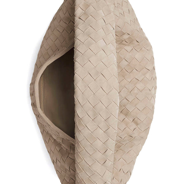 Close-up of Bottega Veneta cross body bags hardware and fine stitching