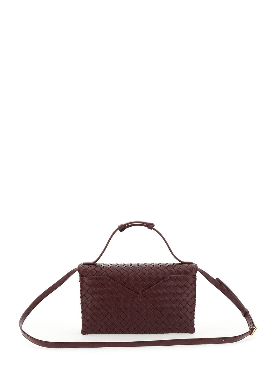 Close-up of Bottega Veneta cross body bags hardware and fine stitching