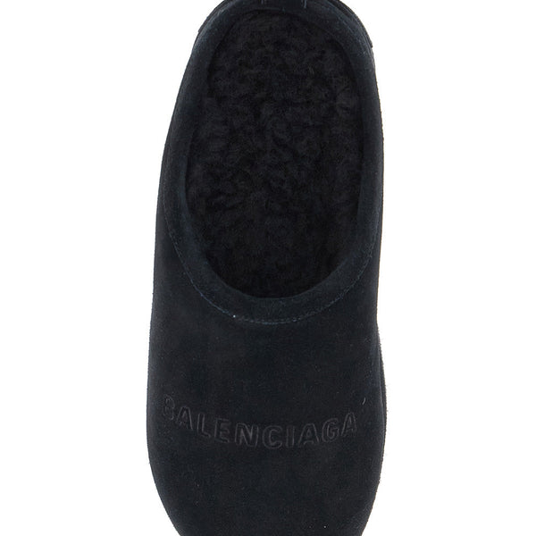 Close-up of Balenciaga flats hardware and fine stitching
