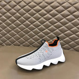 Hermès White Ankle Boots - Angled View