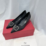 Side profile view of Valentino Garavani luxury piece style No.216