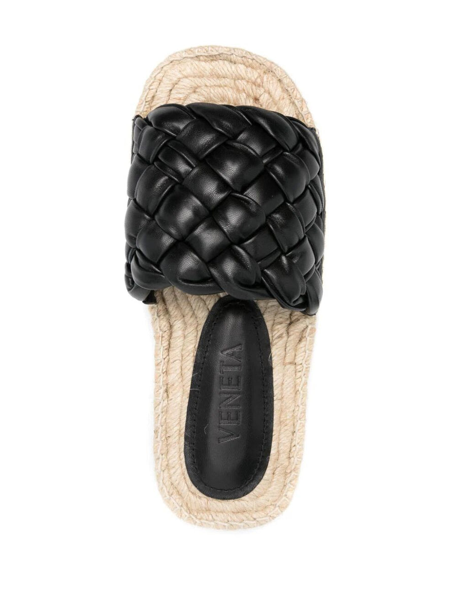 Close-up of Bottega Veneta flats hardware and fine stitching