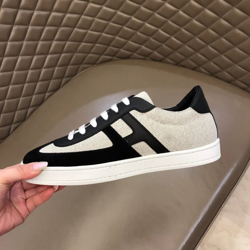 Hermes shoes Style 106 - close-up of classic monogram styling