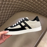 Hermes shoes Style 106 - close-up of classic monogram styling