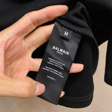 Close-up of Balmain designer clothing craftsmanship