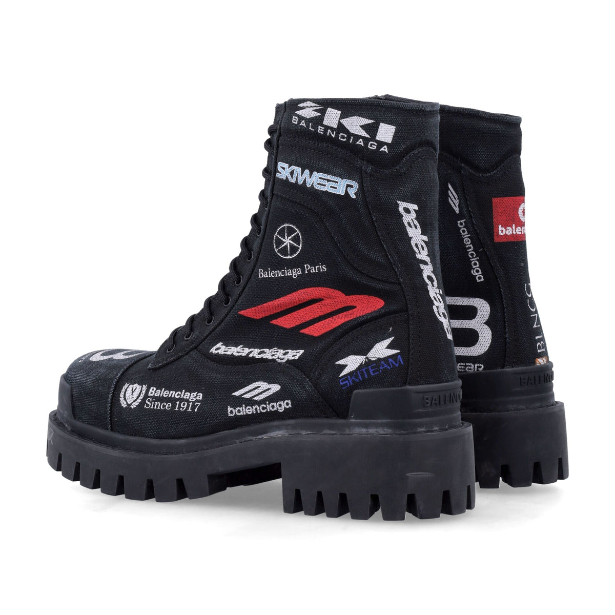 Close-up of Balenciaga boots hardware and fine stitching
