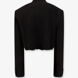 Close-up of Balenciaga blazer and gilet hardware and fine stitching