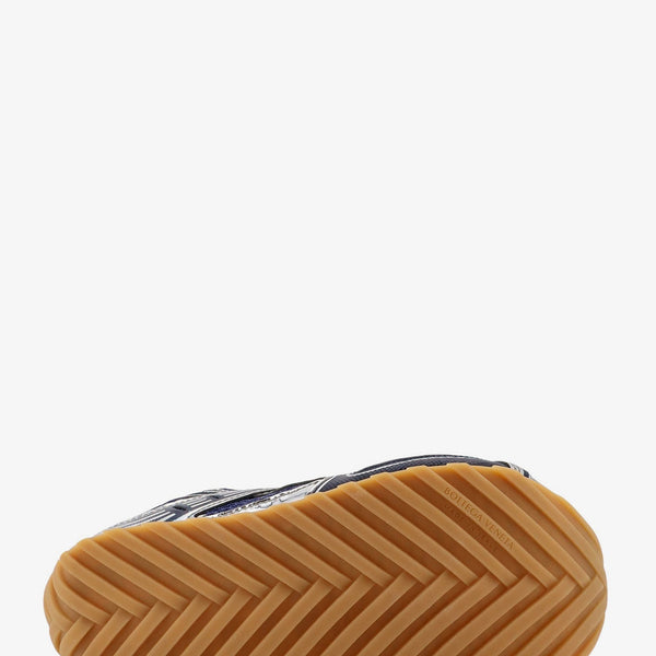 Close-up of Bottega Veneta athletic hardware and fine stitching