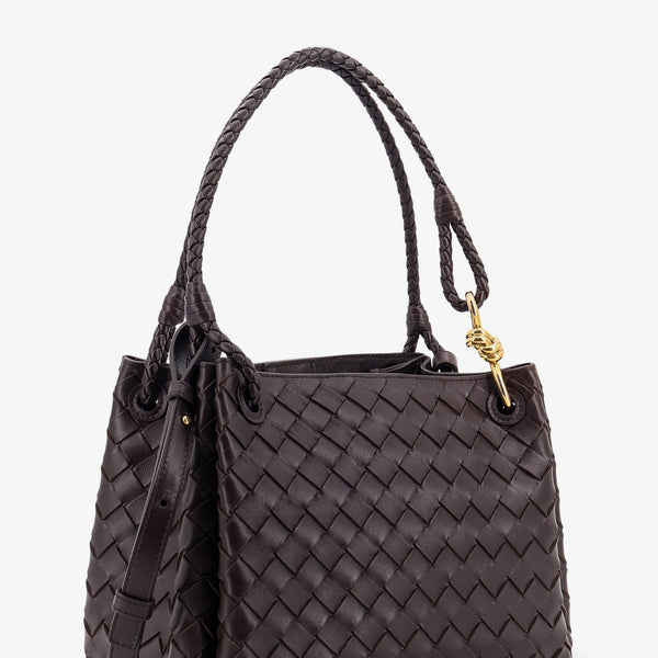 Close-up of Bottega Veneta shoulder bags hardware and fine stitching