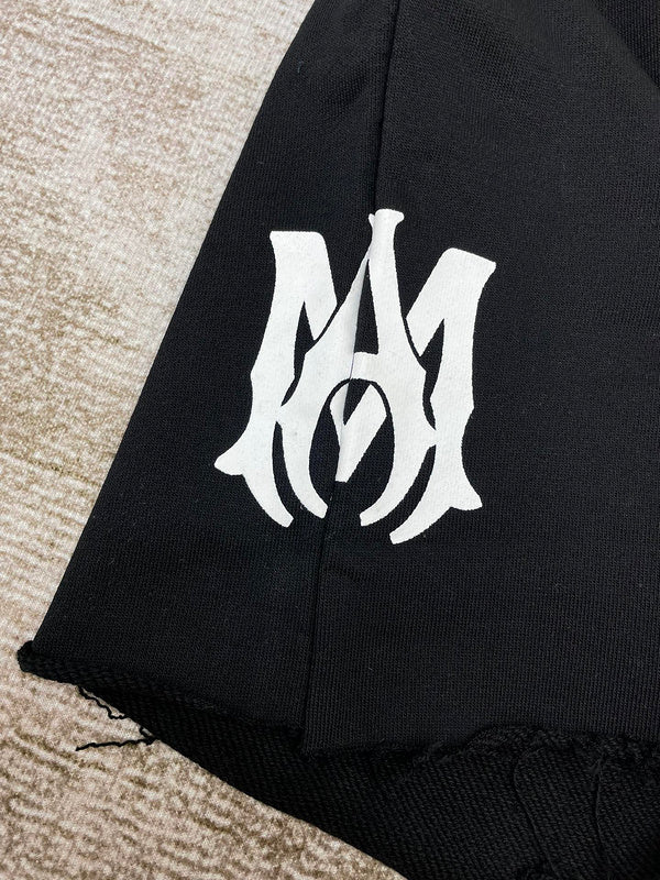 Three-quarter angle view of Amiri luxury piece style No.074