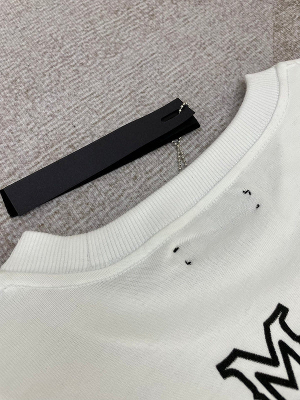 Close-up of Amiri hoodie craftsmanship