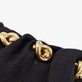 Close-up of Bottega Veneta t-shirts and top hardware and fine stitching