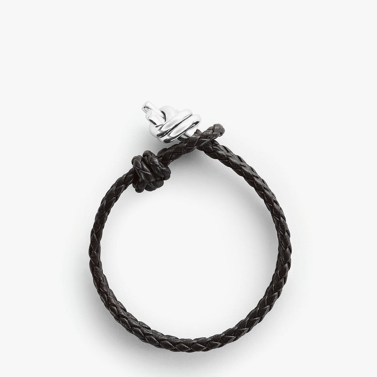 Close-up of Bottega Veneta jewellery hardware and fine stitching