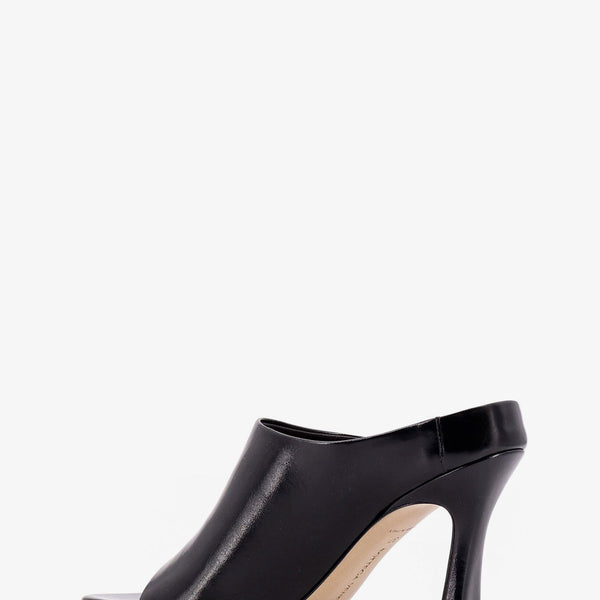 Close-up of Bottega Veneta sandals hardware and fine stitching
