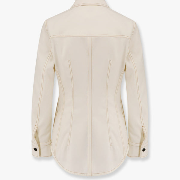 Close-up of Bottega Veneta blouses hardware and fine stitching