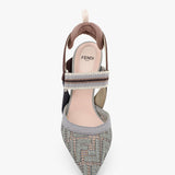 Close-up of Fendi sandals hardware and fine stitching