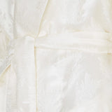 Close-up of Fendi blazer and gilet hardware and fine stitching