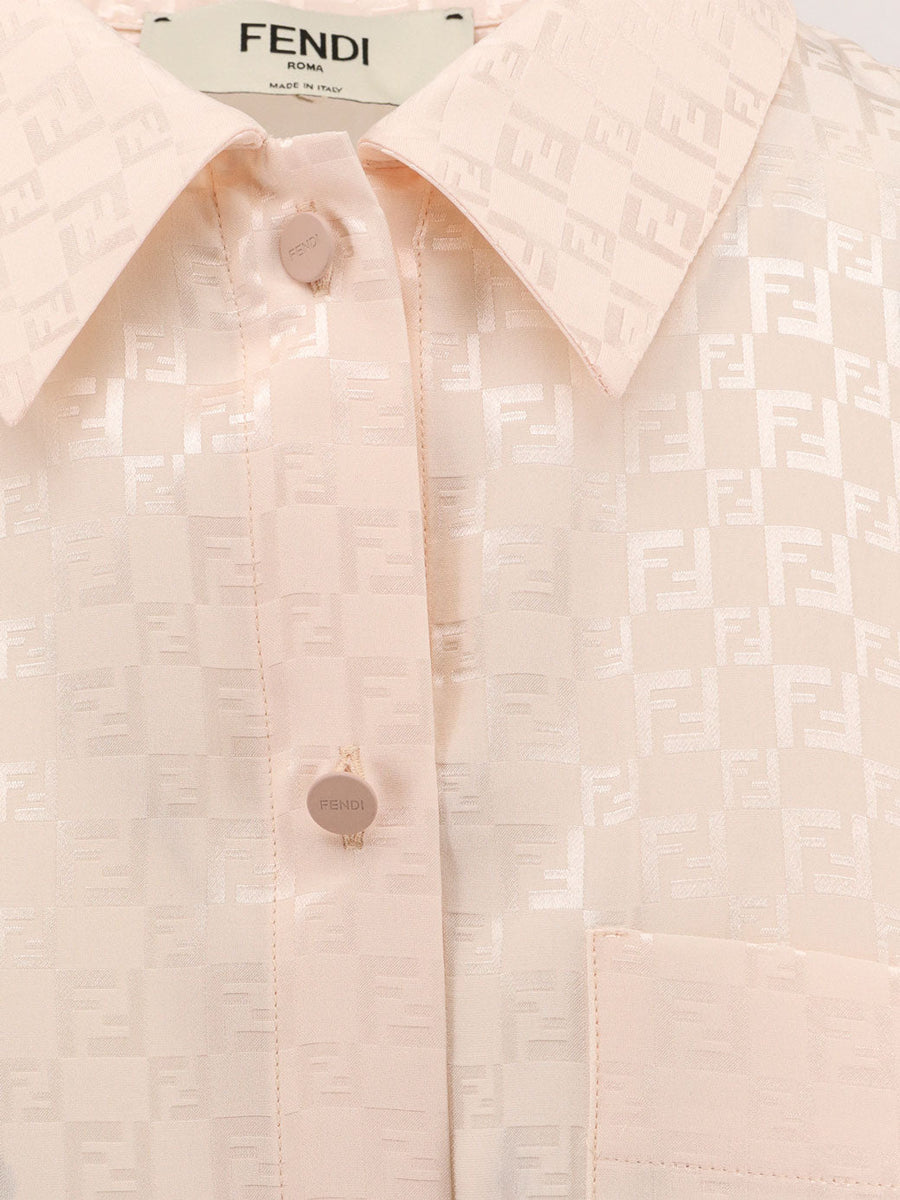 Close-up of Fendi blouses hardware and fine stitching