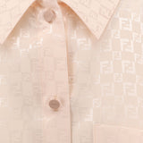 Close-up of Fendi blouses hardware and fine stitching