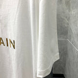 Texture and finish detail of Balmain luxury piece style No.063