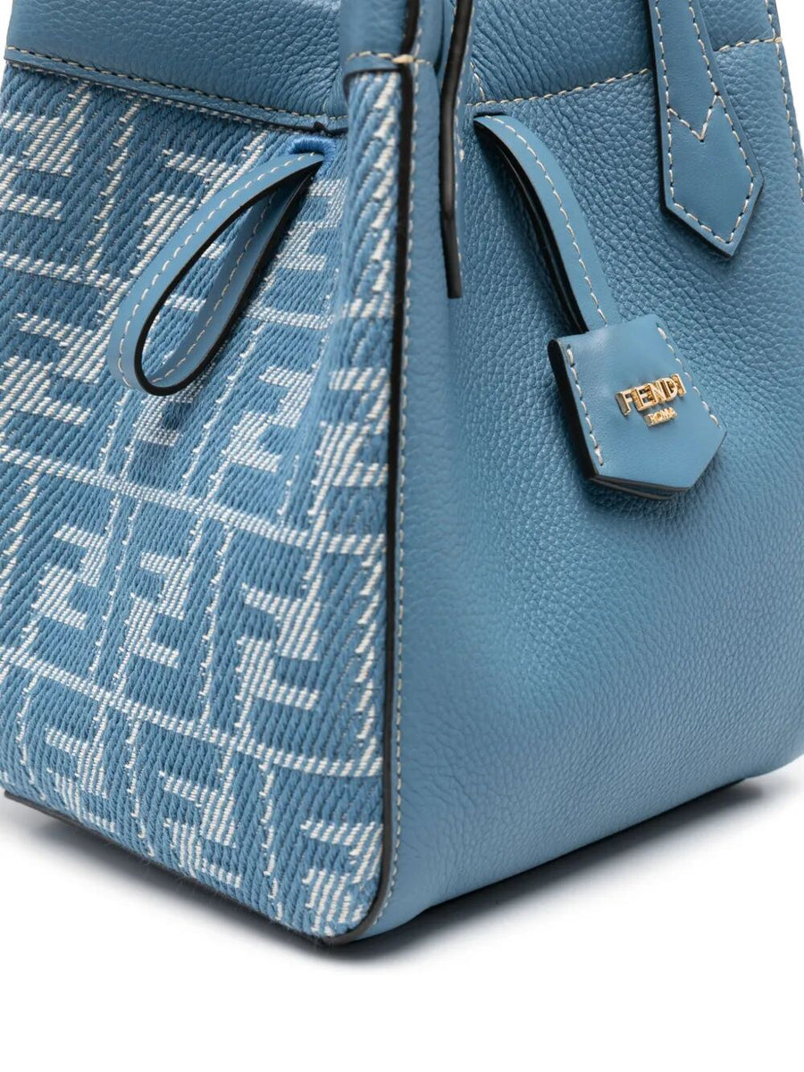 Close-up of Fendi clothing hardware and fine stitching