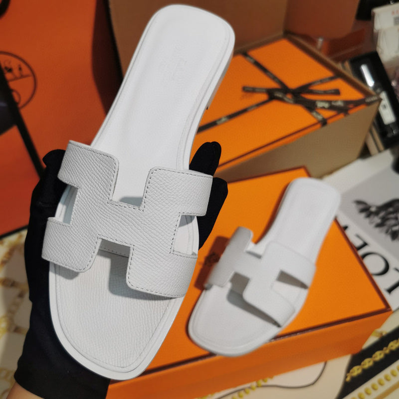Hermes sandals Style 101 - front view, refined designer finish