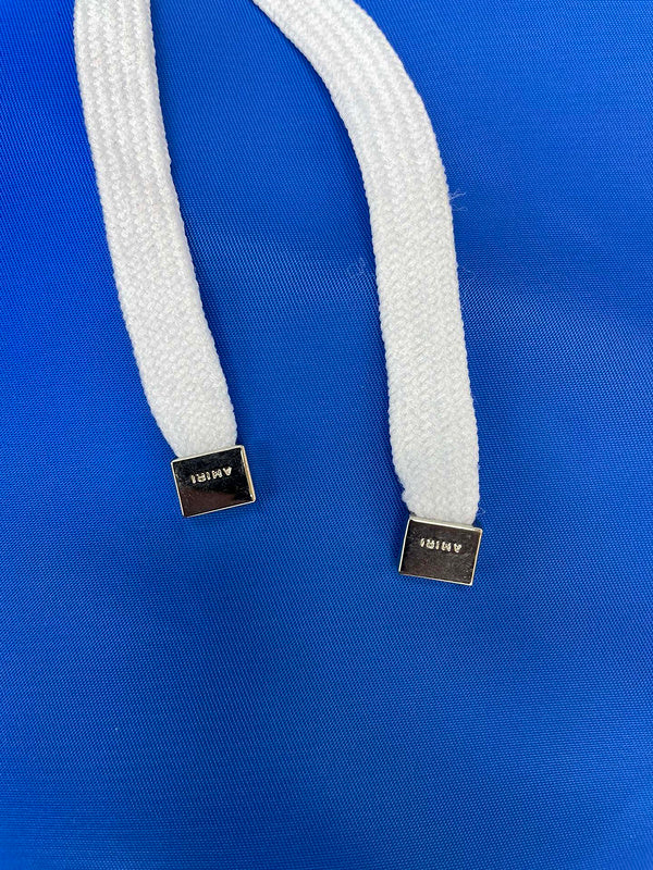 Three-quarter angle view of Amiri luxury piece style No.057