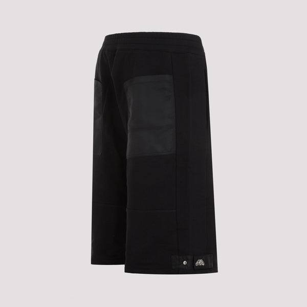 Alexander McQueen pants side profile designer luxury fashion