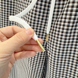 Interior view of Celine Trousers with organised compartments