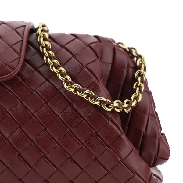 Close-up of Bottega Veneta shoulder bags hardware and fine stitching