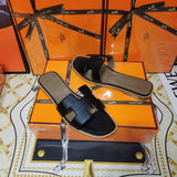 Hermès Grey Gladiator Sandals - Lifestyle Styling Shot