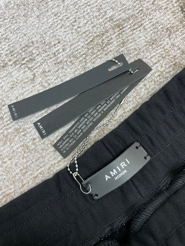 Front view of Amiri luxury piece style No.077