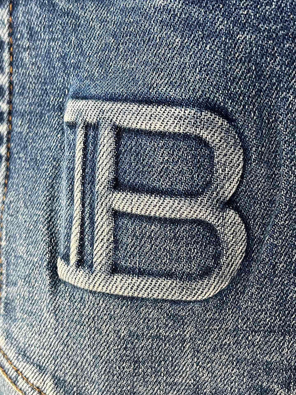 Side profile view of Balmain luxury piece style No.101