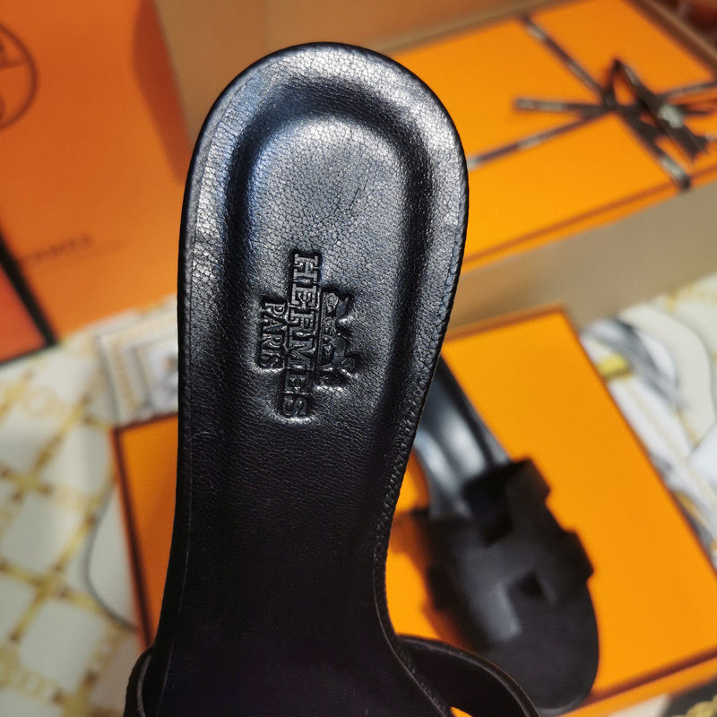 Hermès Black Slide Sandals - Close-Up Texture View