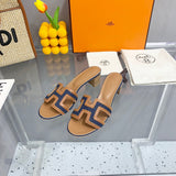 Hermès Chocolate Brown Pointed-Toe Stiletto Heels - Close-Up Texture View