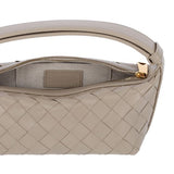 Close-up of Bottega Veneta shoulder bags hardware and fine stitching