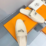 Hermès White Flat Thong Sandals - Close-Up Texture View