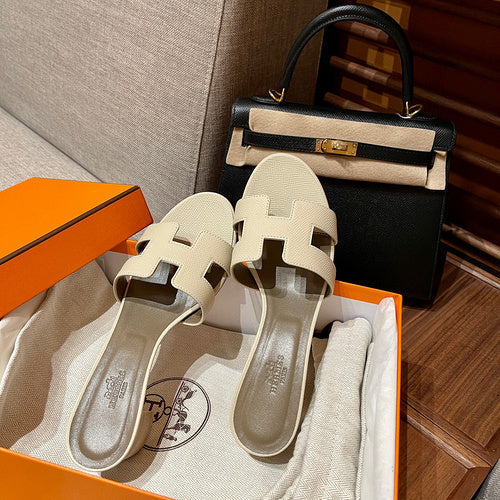 Hermes sandals Style 015 - angled studio shot